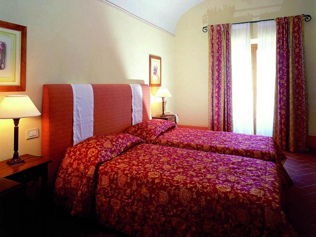 Borgo Il Melone Hotel Cortona Bagian luar foto